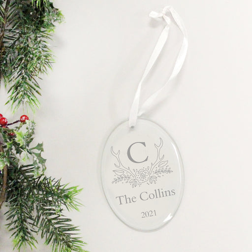 Personalized monogrammed family name christmas ornament.
