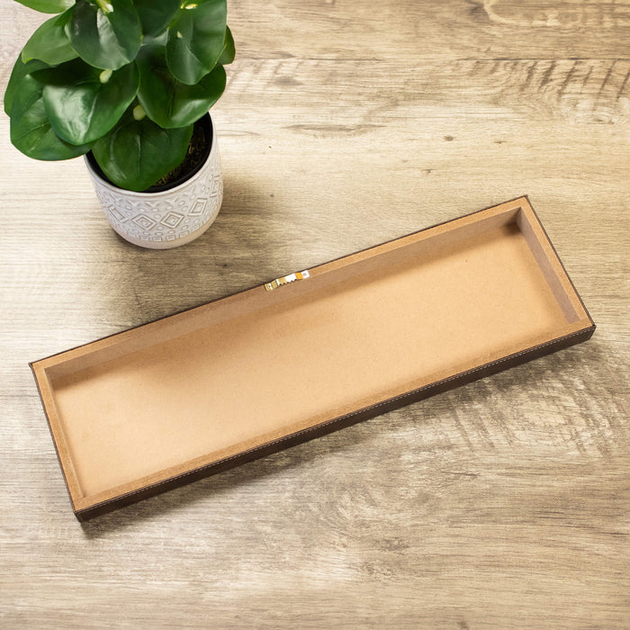 Back view of brown 20x6 vegan leather wall sign