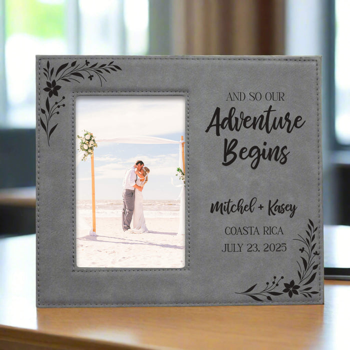 Gray 'Adventure Begins' picture frame personalized with a couple's names and wedding date