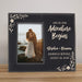 Personalized photo frame with couple at sunset and engraved text on a wooden surface.