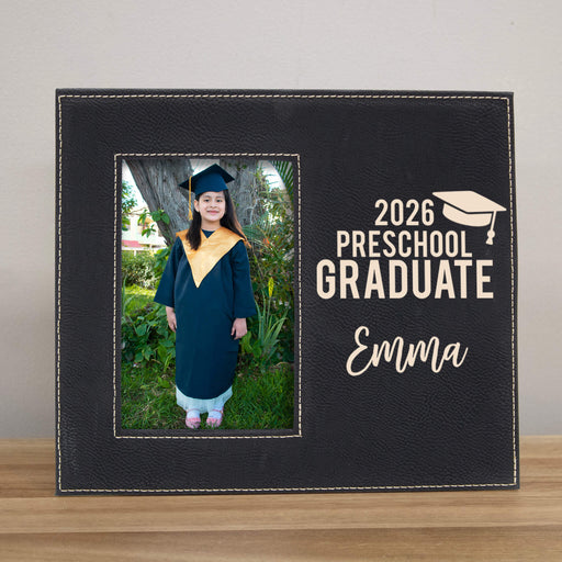 Black frame with a photo of a preschool graduate and '2026 Preschool Graduate' text and personalized name.