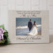 Personalized photo frame with a couple on a beach and engraved text.