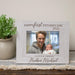 Personalized photo frame for the first Father's Day with a photo of a man holding a baby.