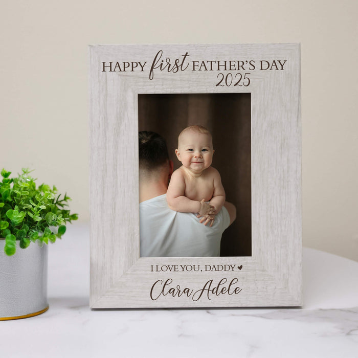 Personalized photo frame for Father's Day with a baby picture and text.