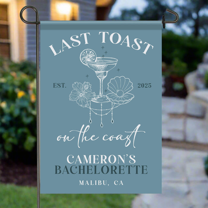 Garden flag with 'Last Toast on the Coast' design for a bachelorette party in Malibu, CA.