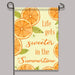 orange slice themed garden flag printed with "Life gets sweeter in the summertime"