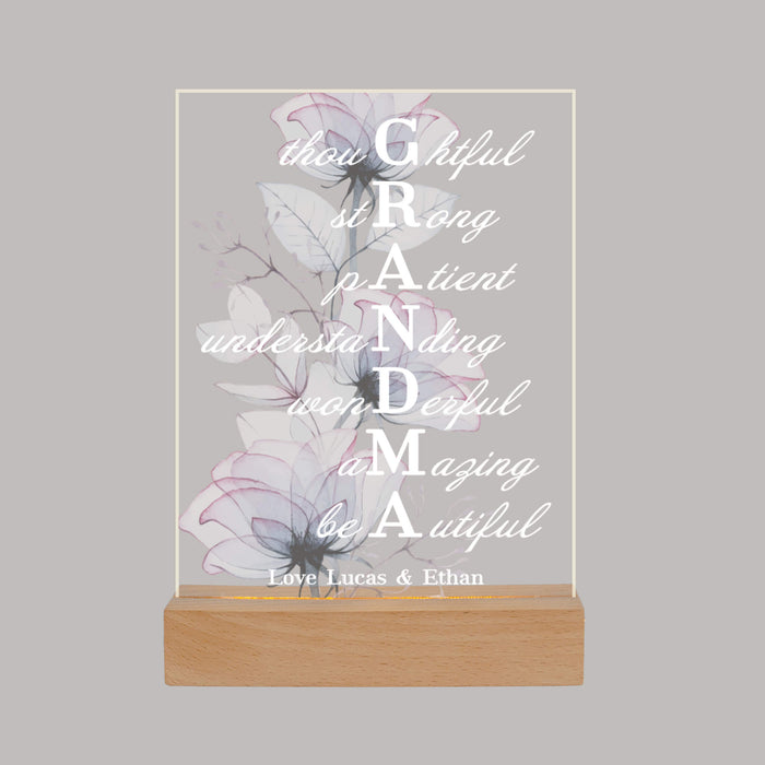 Acrylic LED light with floral design and "GRANDMA" text on a gray background