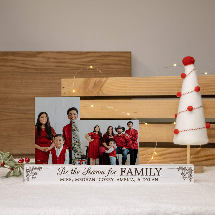 Christmas picture display bar engraved with a holiday saying and custom names. The photo bar is rustic white and comes with two acrylic pane inserts to display your photos in.