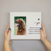 Memorial photo frame with a dog's picture and text on a plain background