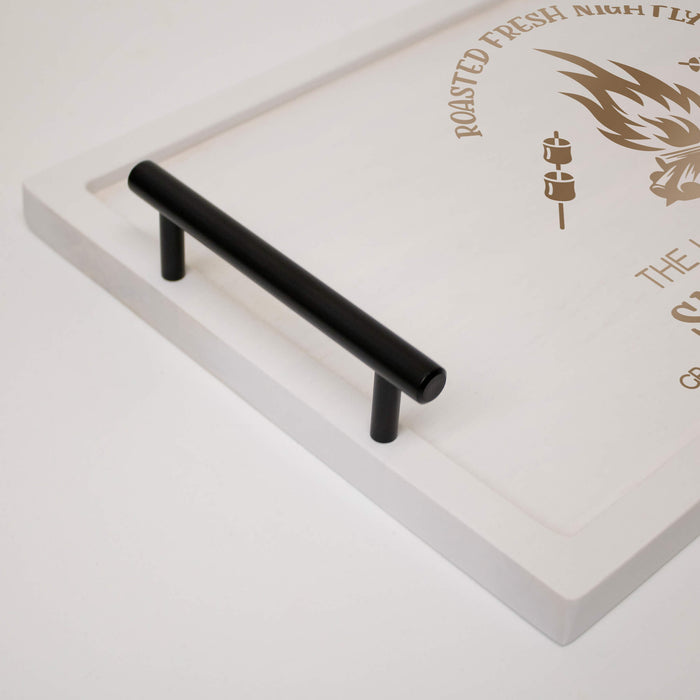 Black handle on a white tray with text and graphics