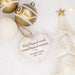 Personalized heart-shaped Christmas ornament engraved with 'Loved beyond words, missed beyond measure. Veronica Gray 1949 - 2025', styled on a white background with gold and white ornaments and decorative tree garlands.