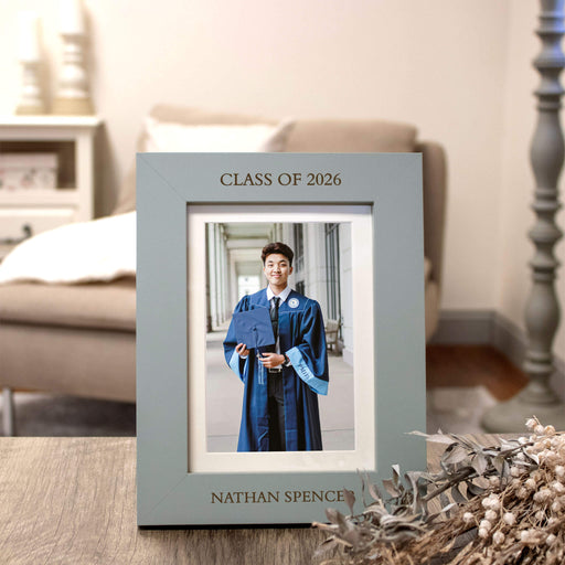 Graduation photo frame with 'Class of 2026' text, displaying a person in a graduation gown.