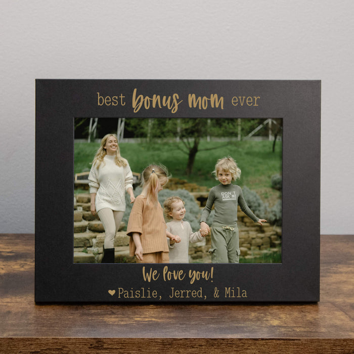 Black photo frame with 'best bonus mom ever' text and a family photo inside.