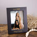Personalized photo frame with 'Girl Mom' text and a family photo inside, on a wooden surface.