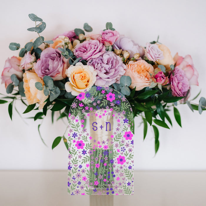floral acrylic flower fave with couple's initials personalized in the center 