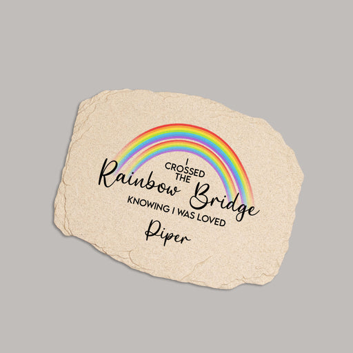 pet memorial garden stone printed with a rainbow bridge design and saying and personalized with a pet's name