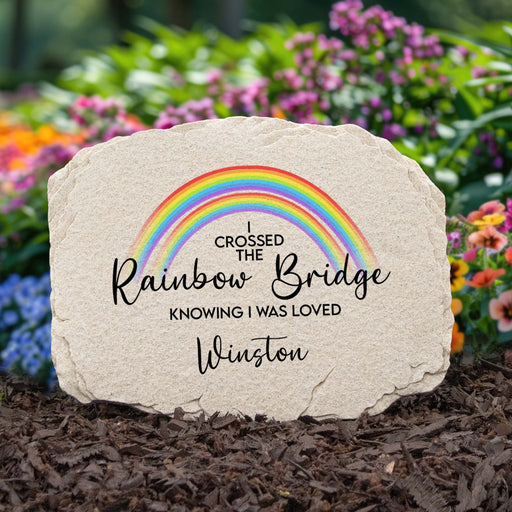 cat memorial garden stone printed with a rainbow design and is personalized