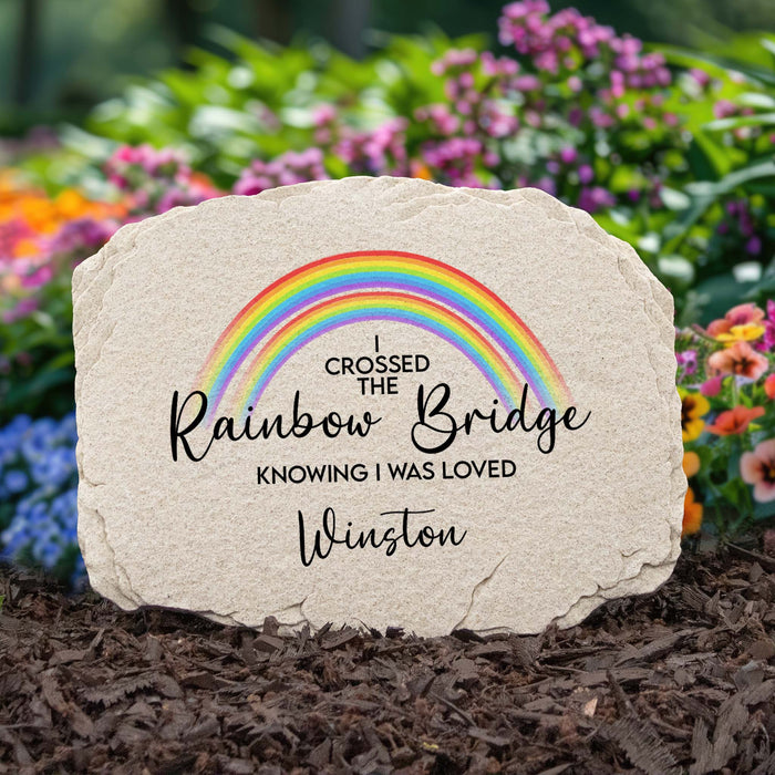 cat memorial garden stone printed with a rainbow design and is personalized