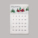 A personalized Christmas countdown calendar hanging on a neutral gray wall. The white fabric calendar features a festive winter illustration at the top with the text 'Merry Christmas' and 'Abbott Family' beneath a red cabin and pine trees.