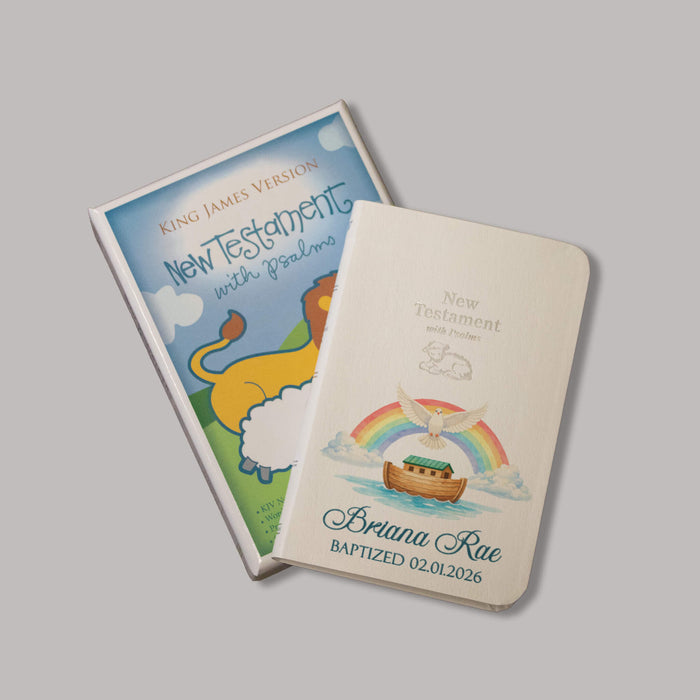 Baby bible decorated with a watercolor image of Noah's Ark and personalized with a name and baptism date