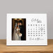 anniversary calendar picture frame with a photo of a bride and groom on a wooden surface