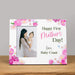 Personalized photo frame with floral design and 'Happy First Mother's Day!' text on a gray background.