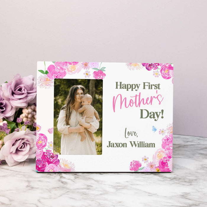 Personalized photo frame for First Mother's Day with floral design and photo of a woman holding a baby.