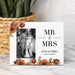 Personalized 'MR & MRS' sign with photo of couple and wedding date, placed on a marble surface with a plant in the background.