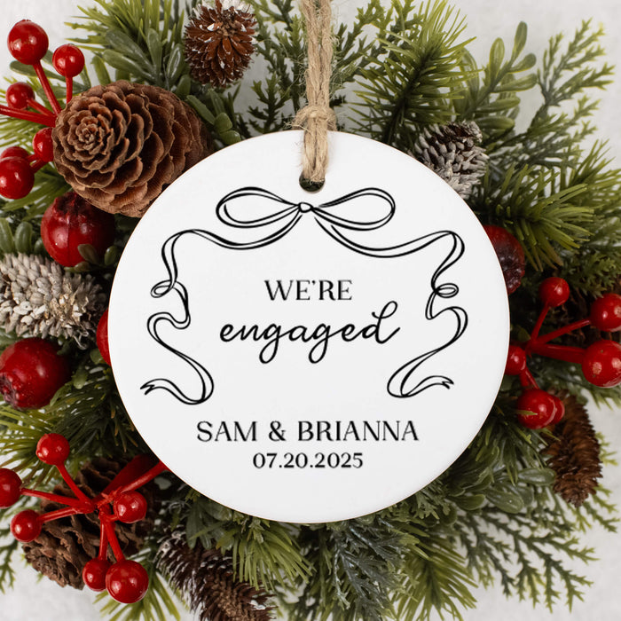 Personalized 'We're Engaged' ornament with Christmas decorations