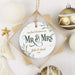 Mr & Mrs Christmas ornament designed with greenery and gold splatter accents