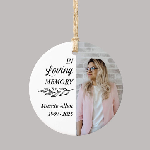 ceramic white memorial Christmas ornament printed with 'In Loving Memory,' a custom name and years of life, and a custom photo of a loved one