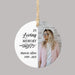 ceramic white memorial Christmas ornament printed with 'In Loving Memory,' a custom name and years of life, and a custom photo of a loved one