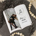 Personalized photo plaque with a couple's photo and text on a decorative surface.