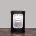 Black wax warmer printed with "Grandma's Garden" and a floral design on a gray background