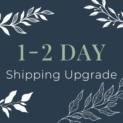 Text '1-2 Day Shipping Upgrade' on a dark blue background with white leaf decorations