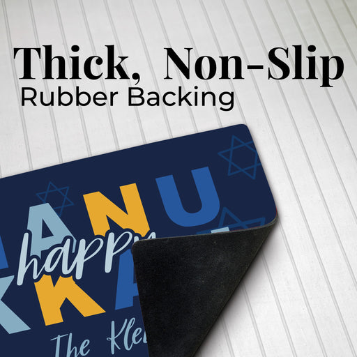Non slip rubber backing on the happy hanukkah doormat