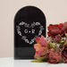 Black Monogrammed Heart Flower Vase next to red roses