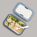 Blue monogrammed bento box with compartments holding food.