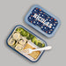Bento box with food compartments and a personalized sports-themed lid on a gray background