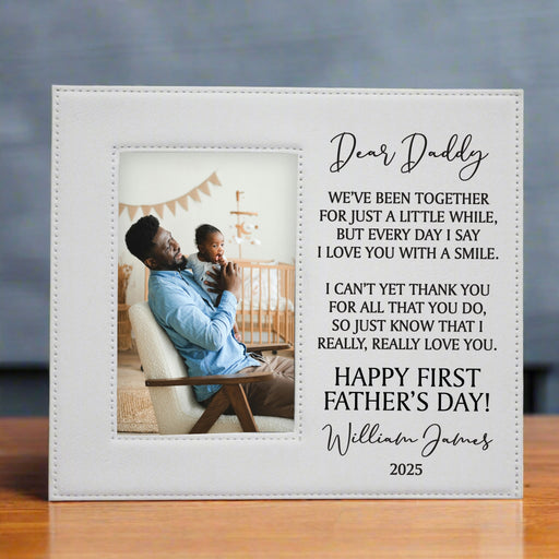 Dear Daddy First Father's Day Picture Frame in white with a photo of a dad and baby