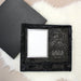 Black glass picture frame engraved with 'Mr & Mr' and personalized text inside a black gift box