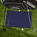 Monogrammed golf towel with golf bag on grass with golf clubs and balls