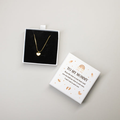 Heart necklace gift for pregnant mom inside a printed gift box