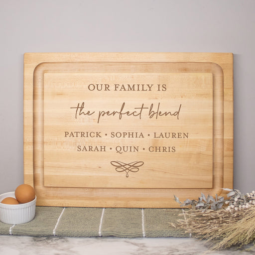 Large butcher block cutting board engraved with blend family's names 