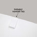 White hanger tag on a gray background with text 'DURABLE HANGER TAG'.