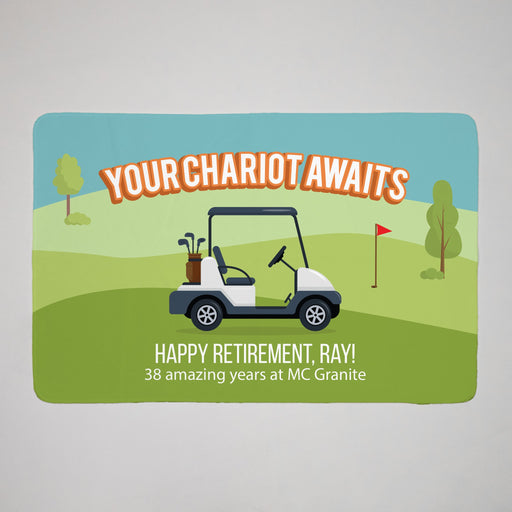 Personalized golf towel with a golf cart and 'Your Chariot Awaits' text on a green field background.