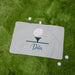 Personalized golf towel with a golf ball design on a grass background