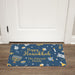 Personalized Happy Hanukkah doormat with family name on a wooden floor.