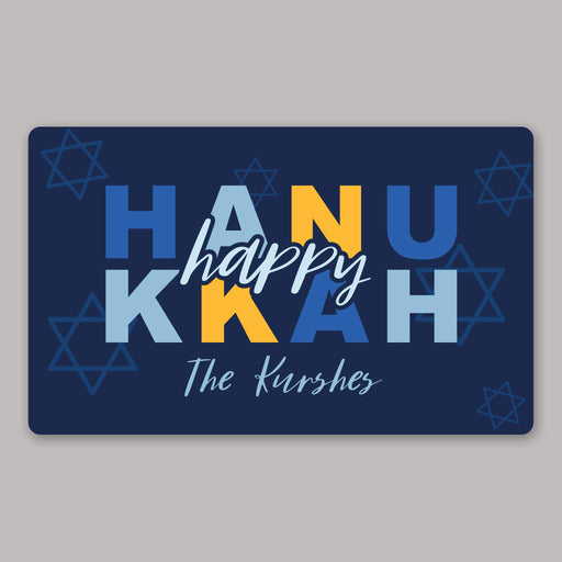 Happy Hanukkah welcome mat with colorful text on a blue background