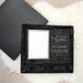 Personalized our first home glass picture frame in a black satin gift box